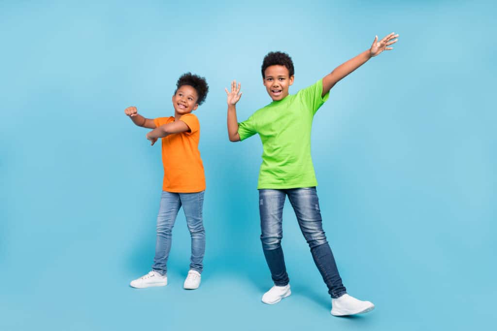 young students on light blue background